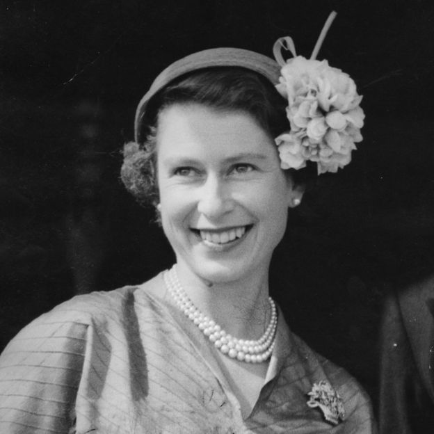 Queen Elizabeth II at Doncaster Racecourse to see the St Leger. An avid racing fan, she began riding lessons at the age of three and is renowned for her knowledge of thoroughbreds and breeding.