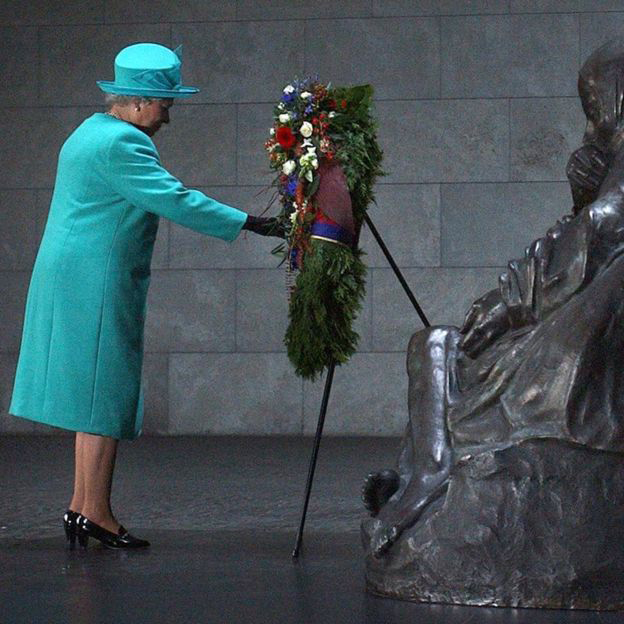 Queen Elizabeth II laying a wreath at the Neue Wache Memorial, a tribute to victims of war and tyranny, in Berlin at the start of her three-day state visit to Germany.